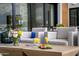 Inviting outdoor lounge featuring a stylish coffee table with drinks and appetizers at 5250 E Deer Valley Dr # 246, Phoenix, AZ 85054