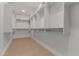 A spacious walk-in closet offers ample shelving and storage options at 5250 E Deer Valley Dr # 246, Phoenix, AZ 85054