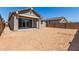 Expansive backyard featuring a covered patio, block wall, and endless possibilities at 5359 W Las Palmaritas Dr, Glendale, AZ 85302