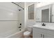 Bathroom with a white sink, vanity, and bath tub at 5359 W Las Palmaritas Dr, Glendale, AZ 85302