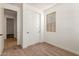 Cozy bedroom featuring a closet and a window for natural light at 5359 W Las Palmaritas Dr, Glendale, AZ 85302