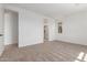 Bright bedroom with carpet, ensuite bathroom, and neutral palette to match any decor at 5359 W Las Palmaritas Dr, Glendale, AZ 85302