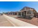 Charming single-story home featuring a two-car garage and desert landscaping at 5359 W Las Palmaritas Dr, Glendale, AZ 85302
