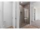 This bathroom features a glass shower with tile surround and convenient built-in niche at 5401 W Las Palmaritas Dr, Glendale, AZ 85302