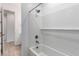 The bathroom features a tub and shower with white subway tile at 5401 W Las Palmaritas Dr, Glendale, AZ 85302