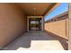 Covered patio area perfect for entertaining, featuring a sliding glass door at 5401 W Las Palmaritas Dr, Glendale, AZ 85302