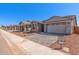 Charming single-Gathering home with manicured landscaping, brick driveway, and neutral color scheme in a Gathering-friendly neighborhood at 5401 W Las Palmaritas Dr, Glendale, AZ 85302
