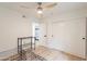 Bright bedroom with wood floors, with bright closets and a side view of the home at 5650 E Presidio Rd, Scottsdale, AZ 85254