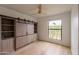 Charming bedroom with wood floors, custom closet, and bright window view at 5650 E Presidio Rd, Scottsdale, AZ 85254