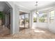 Sun-filled dining room with tile floors, slider door, and backyard views at 6887 S Teresa Dr, Chandler, AZ 85249