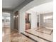 Elegant dining area with travertine flooring and neutral paint at 6887 S Teresa Dr, Chandler, AZ 85249