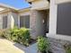 Beautiful home entrance featuring desert landscaping and a stone facade at 6887 S Teresa Dr, Chandler, AZ 85249