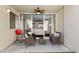 Relaxing patio area with wicker furniture, a ceiling fan, and a barbecue grill at 7625 E Camelback Rd # A110, Scottsdale, AZ 85251