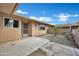 Outdoor courtyard featuring low-maintenance desert landscaping and covered patio area at 9606 W Shasta Dr, Sun City, AZ 85351