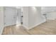 Clean entryway with light wood floors and a bright, open feel at 9606 W Shasta Dr, Sun City, AZ 85351