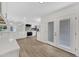 Well-lit kitchen boasting modern appliances, ample counter space, and stylish flooring at 9606 W Shasta Dr, Sun City, AZ 85351