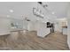 Open-concept living space featuring a modern kitchen and lots of natural light at 9606 W Shasta Dr, Sun City, AZ 85351