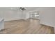 Spacious living room with modern flooring and lots of natural light at 9606 W Shasta Dr, Sun City, AZ 85351
