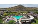 Aerial view of the community pool and surrounding landscaping at 9867 S 182Nd Dr, Goodyear, AZ 85338