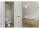 Bedroom with an ensuite half bath at 10226 E Pine Valley Rd, Scottsdale, AZ 85255