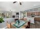 Open-concept dining area leading to kitchen and living room at 10359 E Jacob Ave, Mesa, AZ 85209