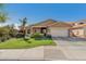 Charming single-story home with manicured front lawn and desert landscaping at 10359 E Jacob Ave, Mesa, AZ 85209