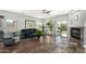 Comfortable living room with fireplace, cozy seating, and natural light at 10359 E Jacob Ave, Mesa, AZ 85209