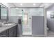 Bathroom featuring a granite countertop, a sink, and a glass shower at 10434 E Jacob Ave, Mesa, AZ 85209