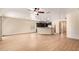 Open-concept living space with tile flooring, recessed lighting, and dark cabinetry at 10859 E Thatcher Ave, Mesa, AZ 85212