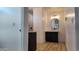 Modern bathroom with a vanity, vessel sink, and glass enclosed shower at 11612 S 211Th Ln, Buckeye, AZ 85326