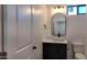 Well-lit bathroom with a toilet, sleek vanity, and vessel sink at 11612 S 211Th Ln, Buckeye, AZ 85326