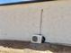 Close-up of a Triden air conditioner, showcasing the home's modern and energy-efficient systems at 11612 S 211Th Ln, Buckeye, AZ 85326