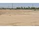 Expansive land with a white fence, perfect for a Gathering looking for space and outdoor activities at 11612 S 211Th Ln, Buckeye, AZ 85326