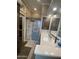 Bathroom with a glass door shower, large mirror, and ample vanity space at 1277 S Shawnee Dr, Apache Junction, AZ 85119