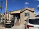 Charming exterior view of the home with a well-maintained front yard and covered porch at 1277 S Shawnee Dr, Apache Junction, AZ 85119