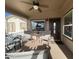 Inviting covered front porch features seating area, and a welcoming entrance at 1277 S Shawnee Dr, Apache Junction, AZ 85119