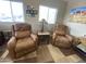 Sun-drenched living room with comfortable recliner chairs, perfect for relaxing and enjoying the natural light at 1277 S Shawnee Dr, Apache Junction, AZ 85119