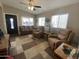 Inviting living room offering comfortable seating, natural light, and a stylish neutral color palette at 1277 S Shawnee Dr, Apache Junction, AZ 85119