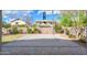 Spacious backyard featuring a stone patio and brick wall surround at 1280 E Redwood Dr, Chandler, AZ 85286