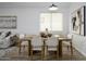 Cozy dining area with a modern table, stylish chairs and decor at 1280 E Redwood Dr, Chandler, AZ 85286