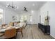 Bright, open-concept living area with modern furnishings and dining space at 1280 E Redwood Dr, Chandler, AZ 85286