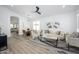 Open-concept living room featuring a dining area and modern furnishings at 1280 E Redwood Dr, Chandler, AZ 85286