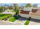 Aerial view of a house with lush landscaping and a desert backdrop at 13375 N 96Th Pl, Scottsdale, AZ 85260