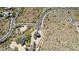 Stunning aerial view of a meticulously planned community, showcasing lush greenery and desert surroundings at 16856 N Mountain Pkwy, Fountain Hills, AZ 85268