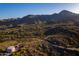 Stunning aerial view of desert landscape with luxury homes nestled in the hillsides at 16856 N Mountain Pkwy, Fountain Hills, AZ 85268