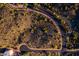 Aerial view of winding roads through a desert landscape at 16856 N Mountain Pkwy, Fountain Hills, AZ 85268