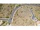 Aerial showing well-maintained roads and planned community layout amidst desert scenery at 16856 N Mountain Pkwy, Fountain Hills, AZ 85268