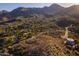Desert homes among hills and mountains under a bright sky at 16856 N Mountain Pkwy, Fountain Hills, AZ 85268
