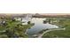 Beautiful community lake with fountain, walking paths, and lush green landscape at 16856 N Mountain Pkwy, Fountain Hills, AZ 85268