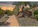 Eagles Nest entrance sign with desert landscaping and walking path leading to the community at 16856 N Mountain Pkwy, Fountain Hills, AZ 85268